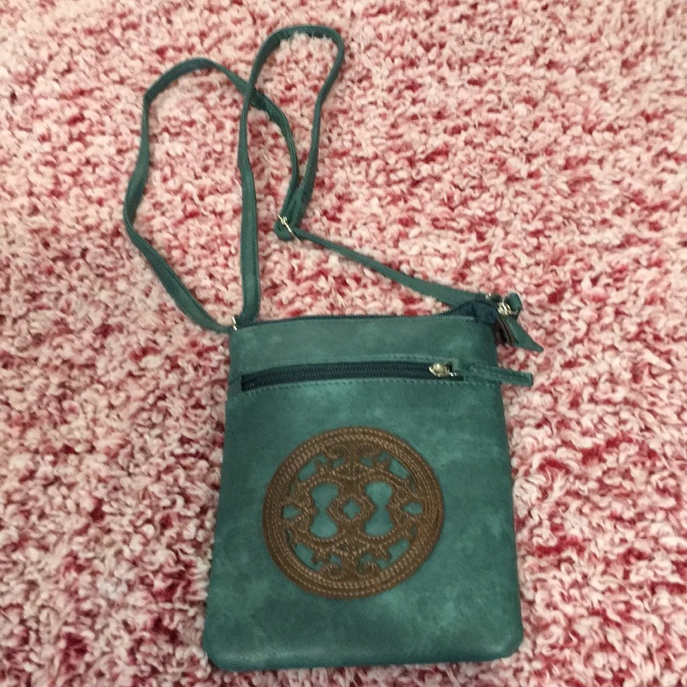 Small turquoise leather purse with strap